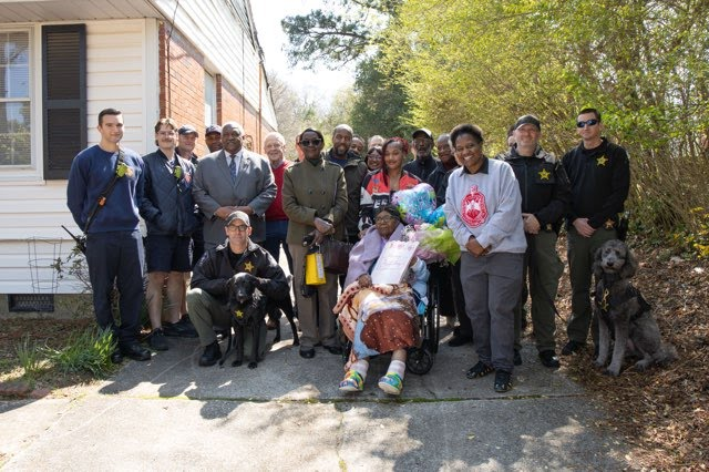 Celebrating a community milestone with neighbors and deputies
